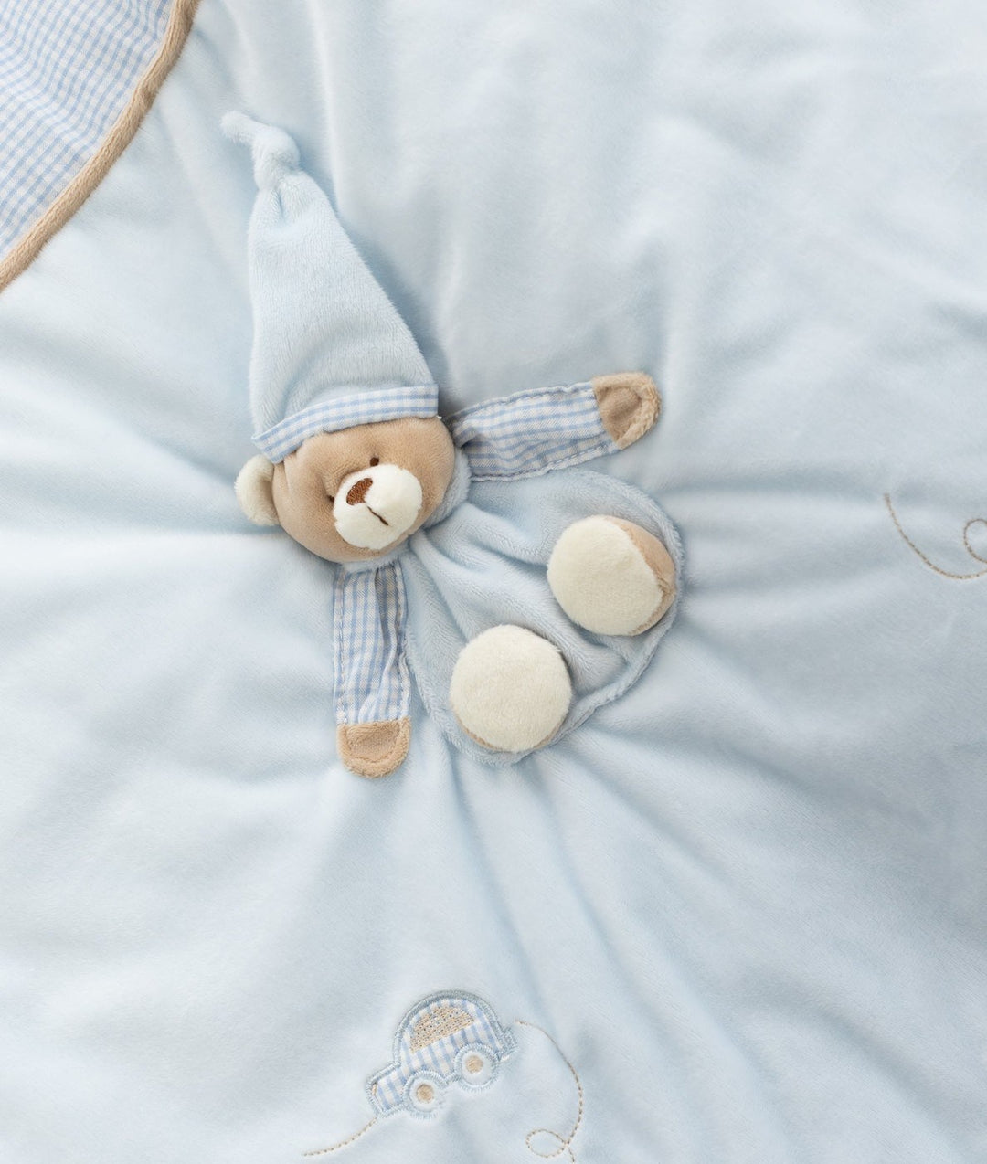 Plush light blue blanket texture with 3D teddy bear applique and toy car design