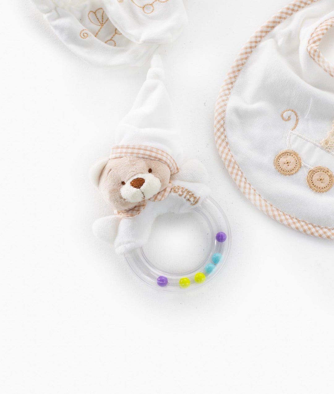 Sensory ring rattle with colorful beads and plush bear topper