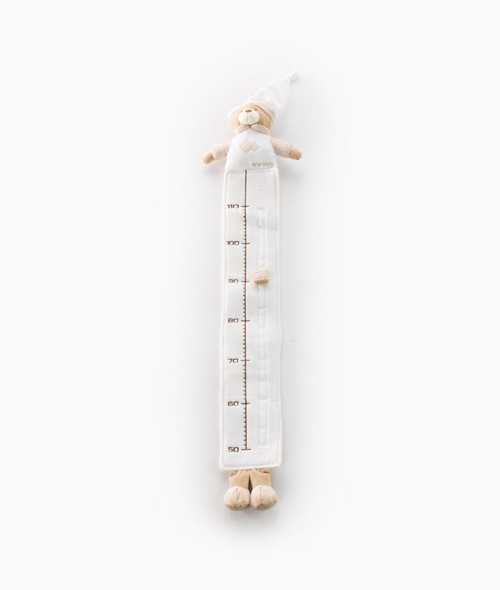 Full length beige and white plush baby growth chart with bear nightcap and measuring strip from 50 to 110