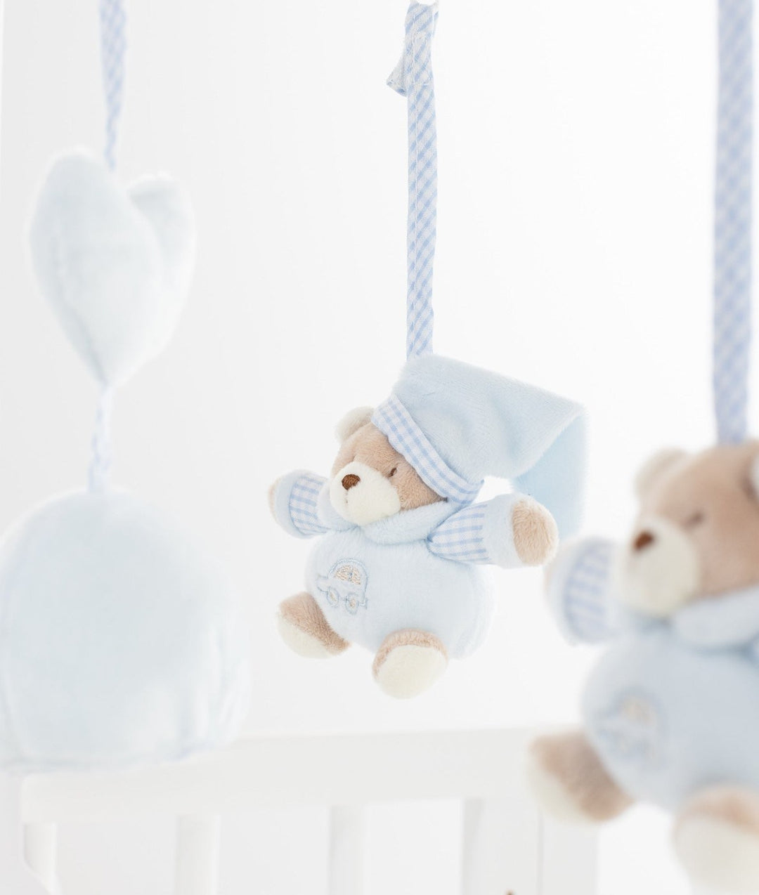 light blue plush bear musical mobile with checkered nightcap and pajamas