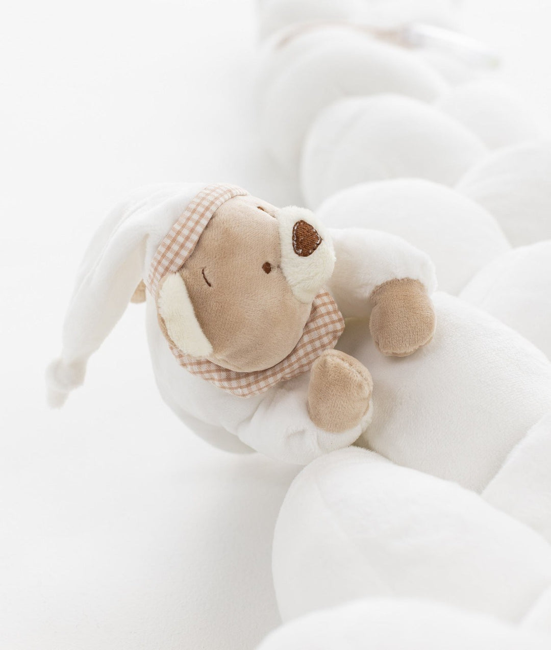 Braided toddler bolster in white and beige