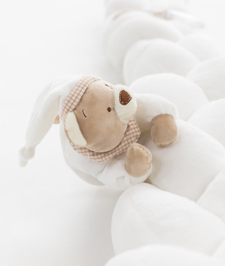 Braided toddler bolster in white and beige