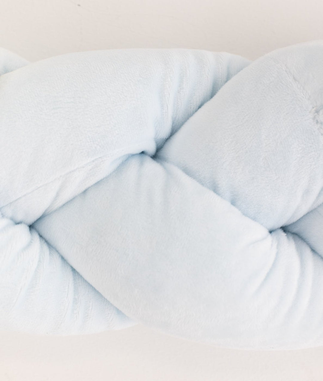 Braided toddler bolster in blue
