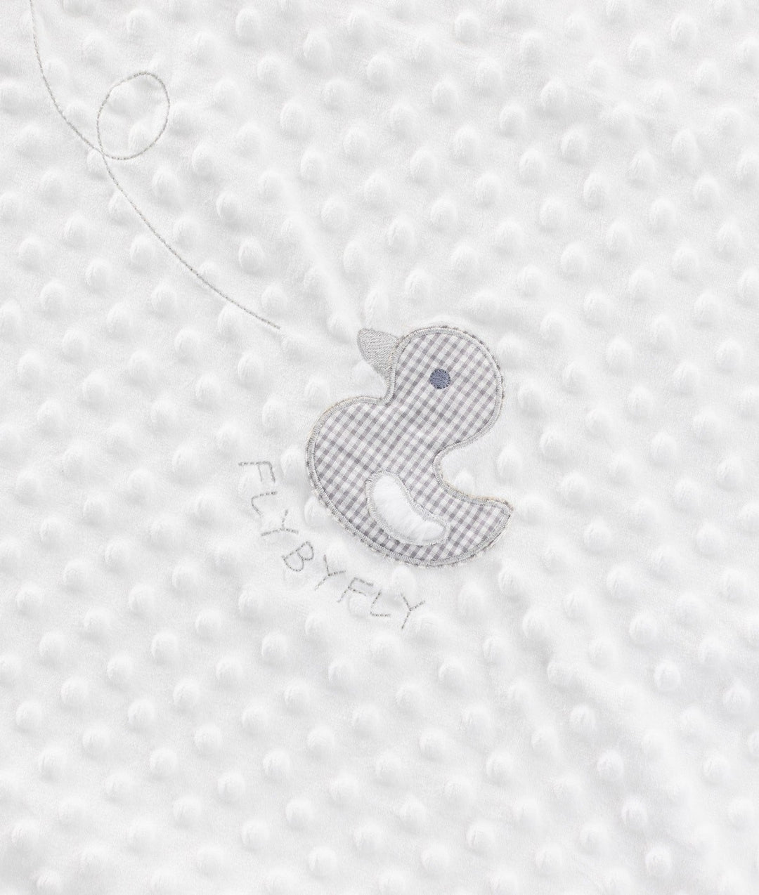Grey gingham duck patch detail on white dotted baby blanket