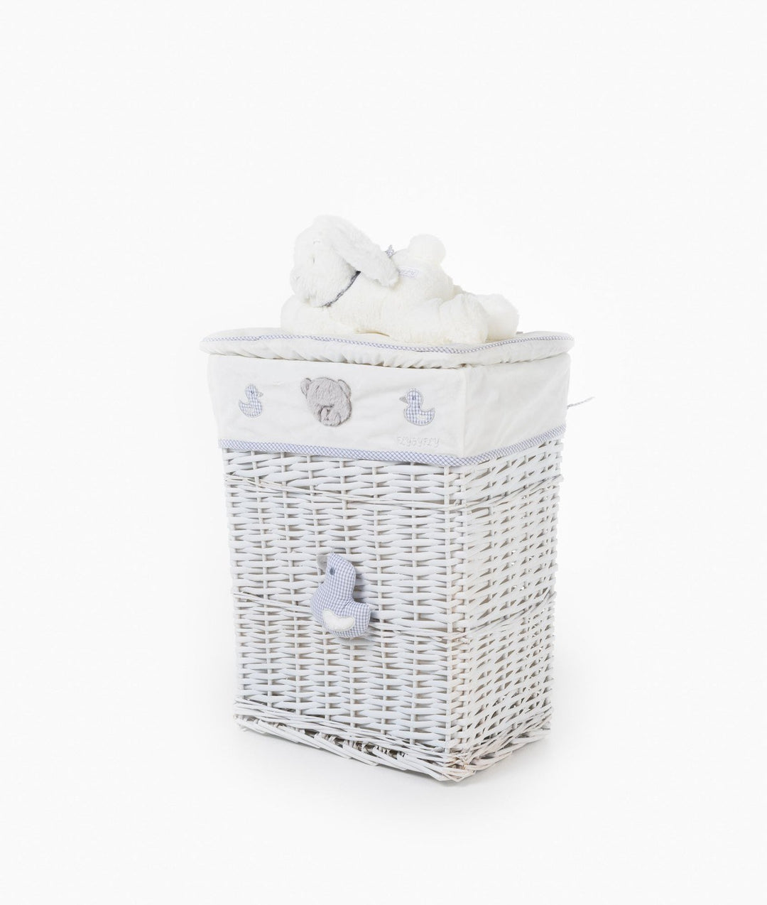 Angled view of white woven storage basket with duck applique, embroidered motifs, and plush bunny lid