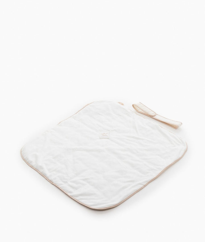 White cotton swaddle reverse side showing smooth texture and woven label