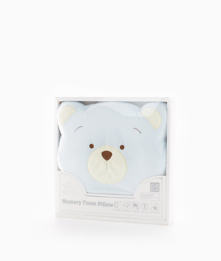 Light blue bear-shaped memory foam pillow in white retail box labeled for 0-6 months infants