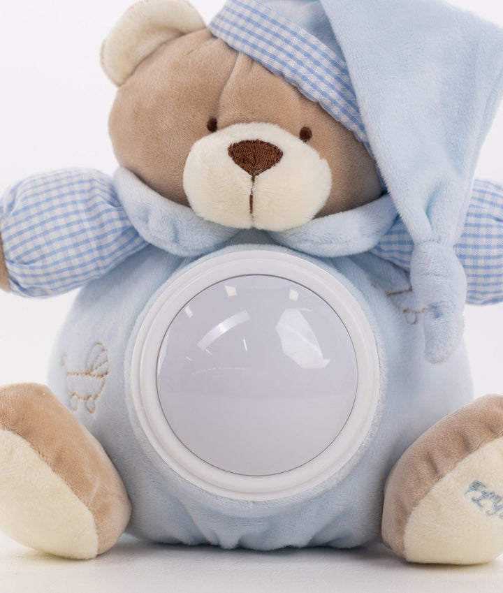 Close-up of blue musical night light showing soft velour texture and glossy light panel