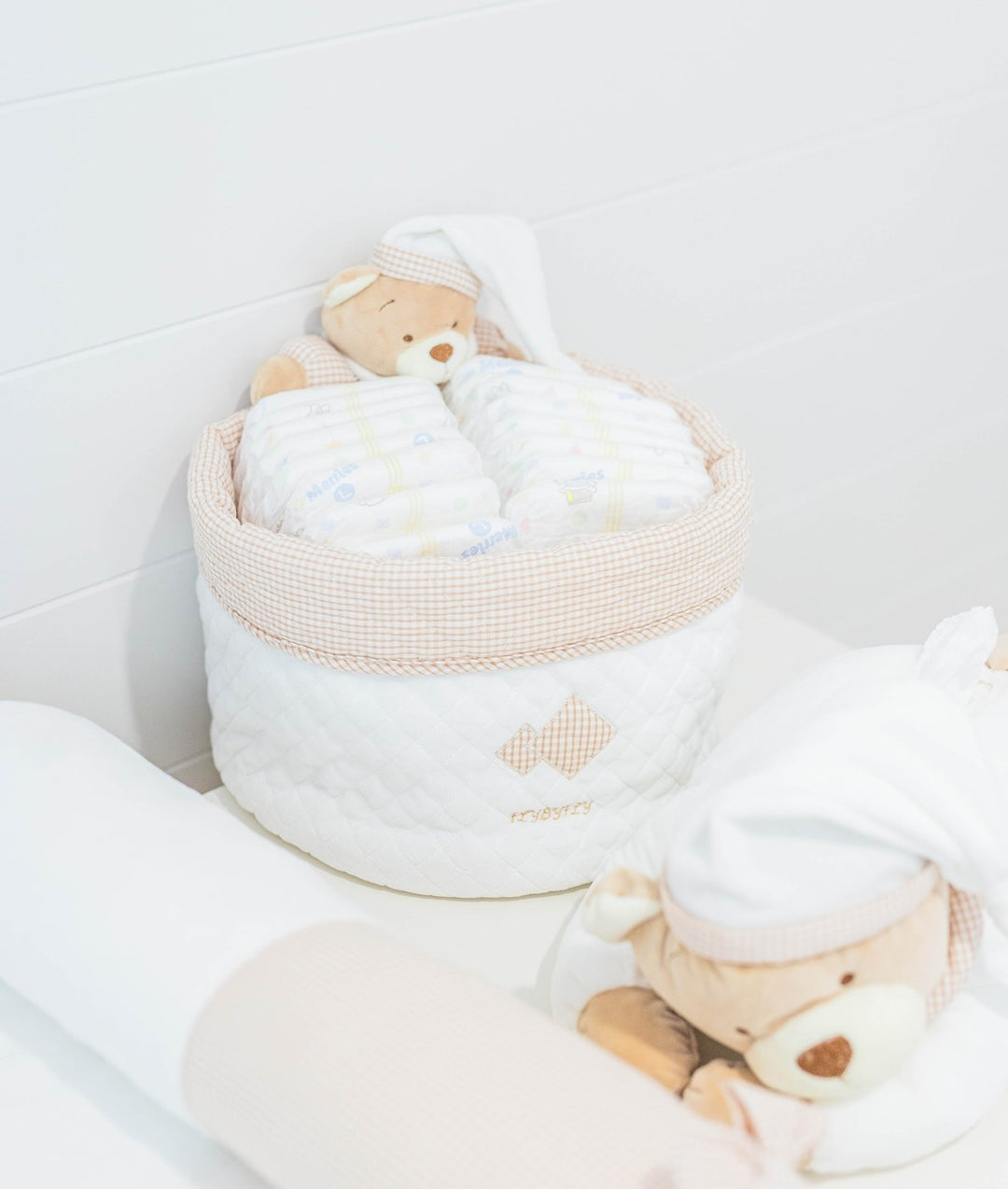 Baby nappy caddy for nursery in white and beige