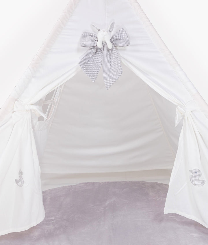 Front view of white teepee tent with grey gingham bunny appliqué and duck embroidery