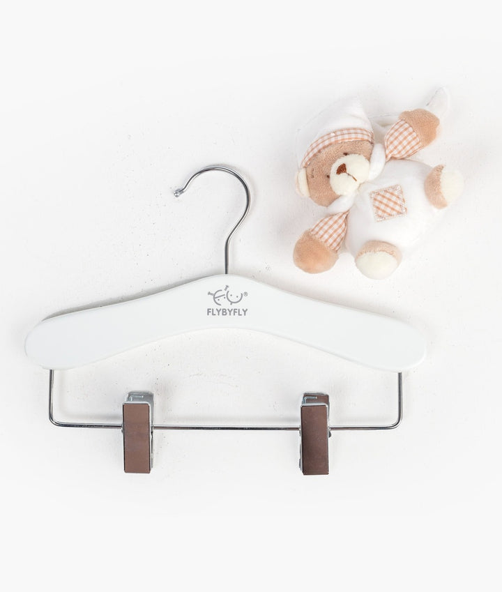 White and beige wooden hanger with clips