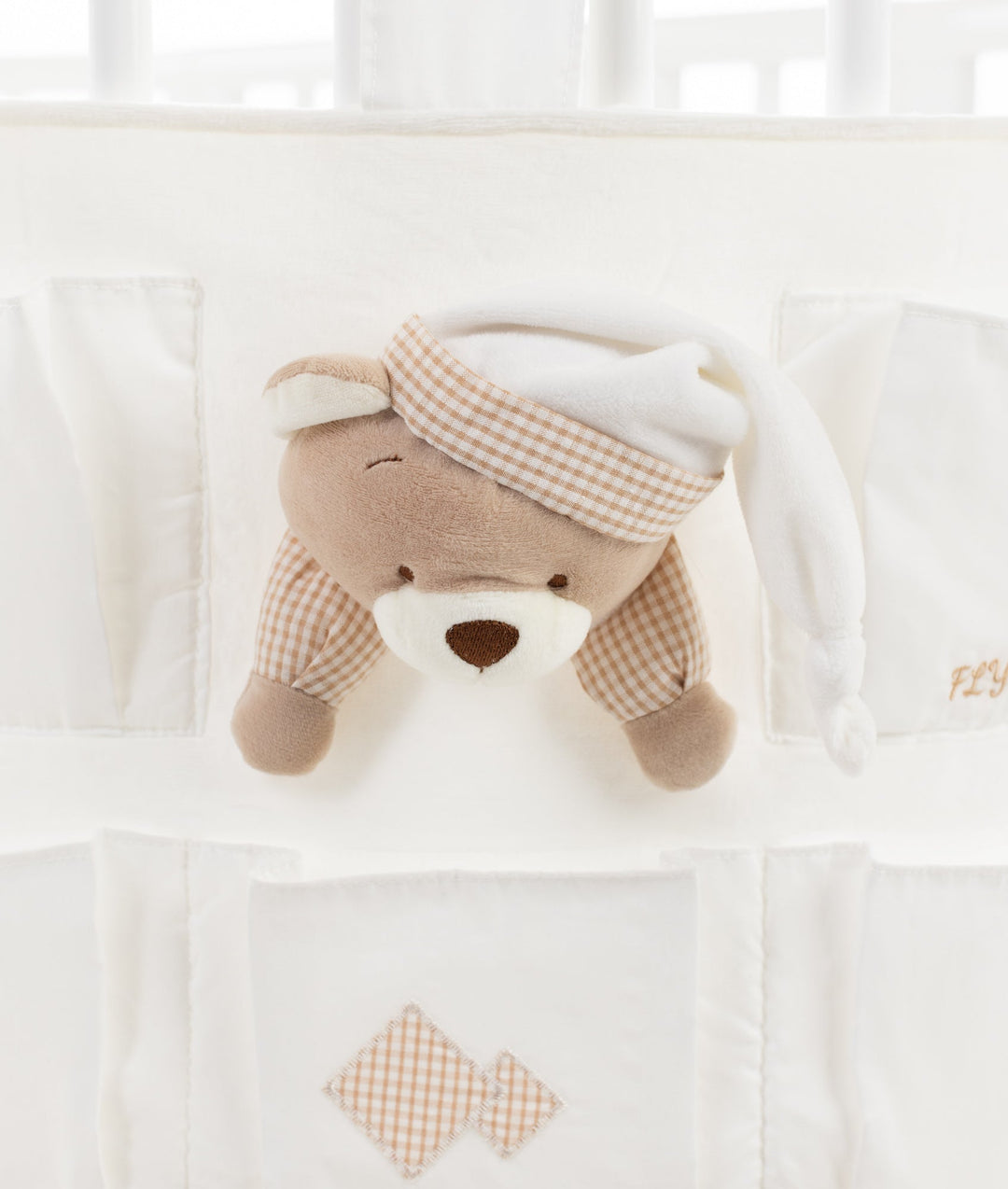 Baby nursery organiser in white and beige