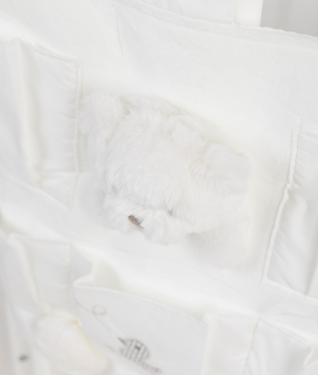 Baby nursery organiser in white and grey