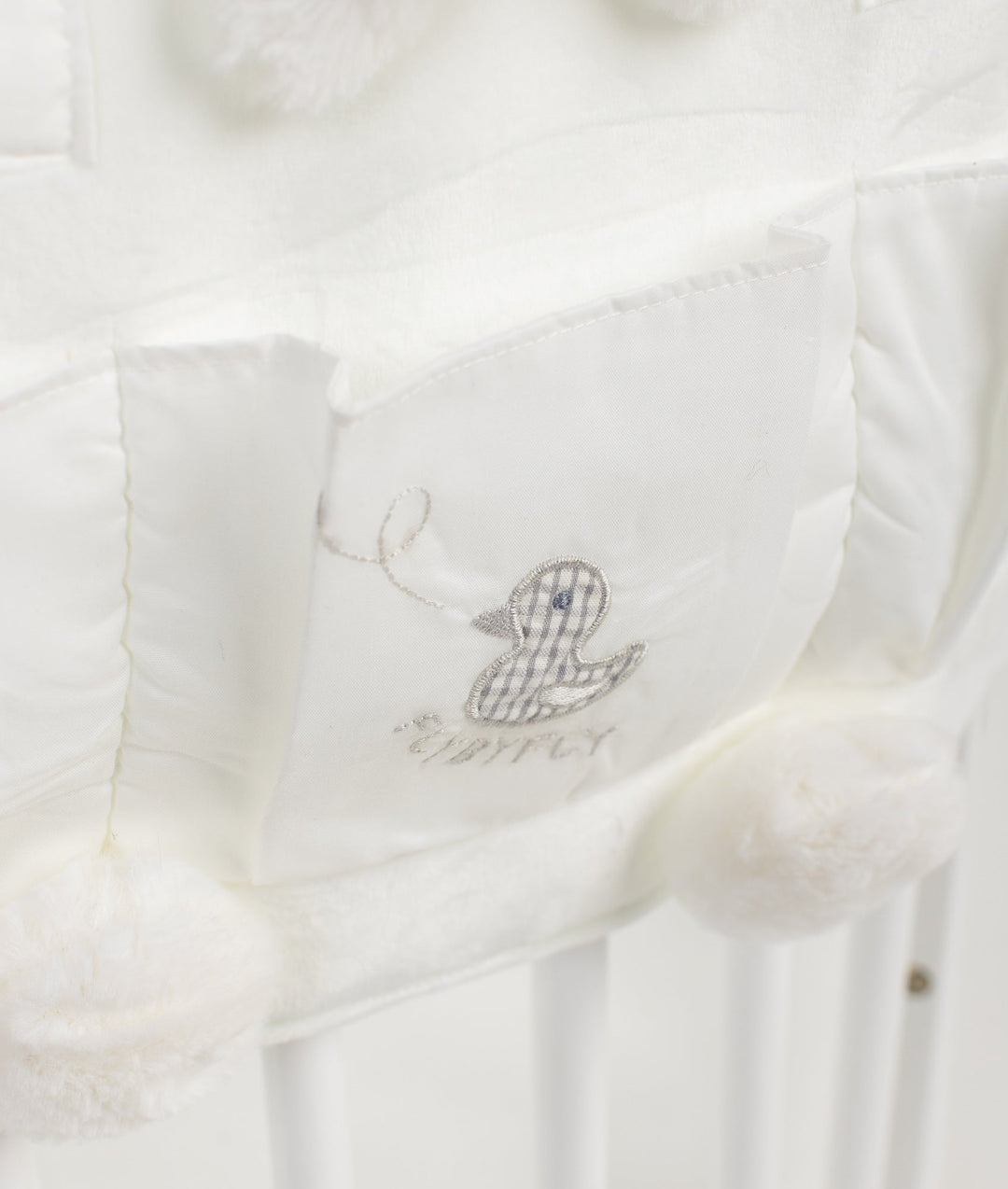 Baby nursery organiser in white and grey